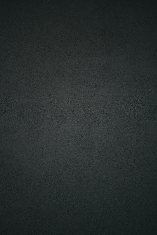 dark textured plaster wall