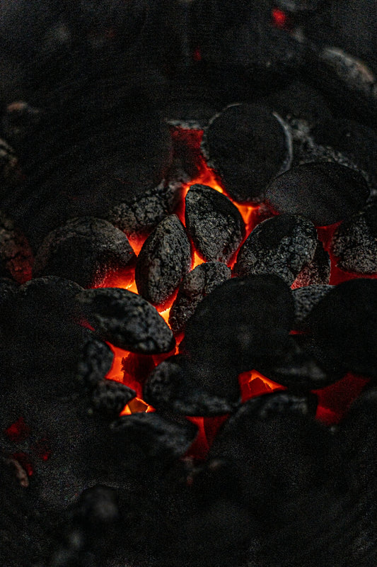 black and red stones on black soil