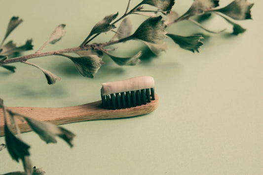 pink and brown brush on white surface