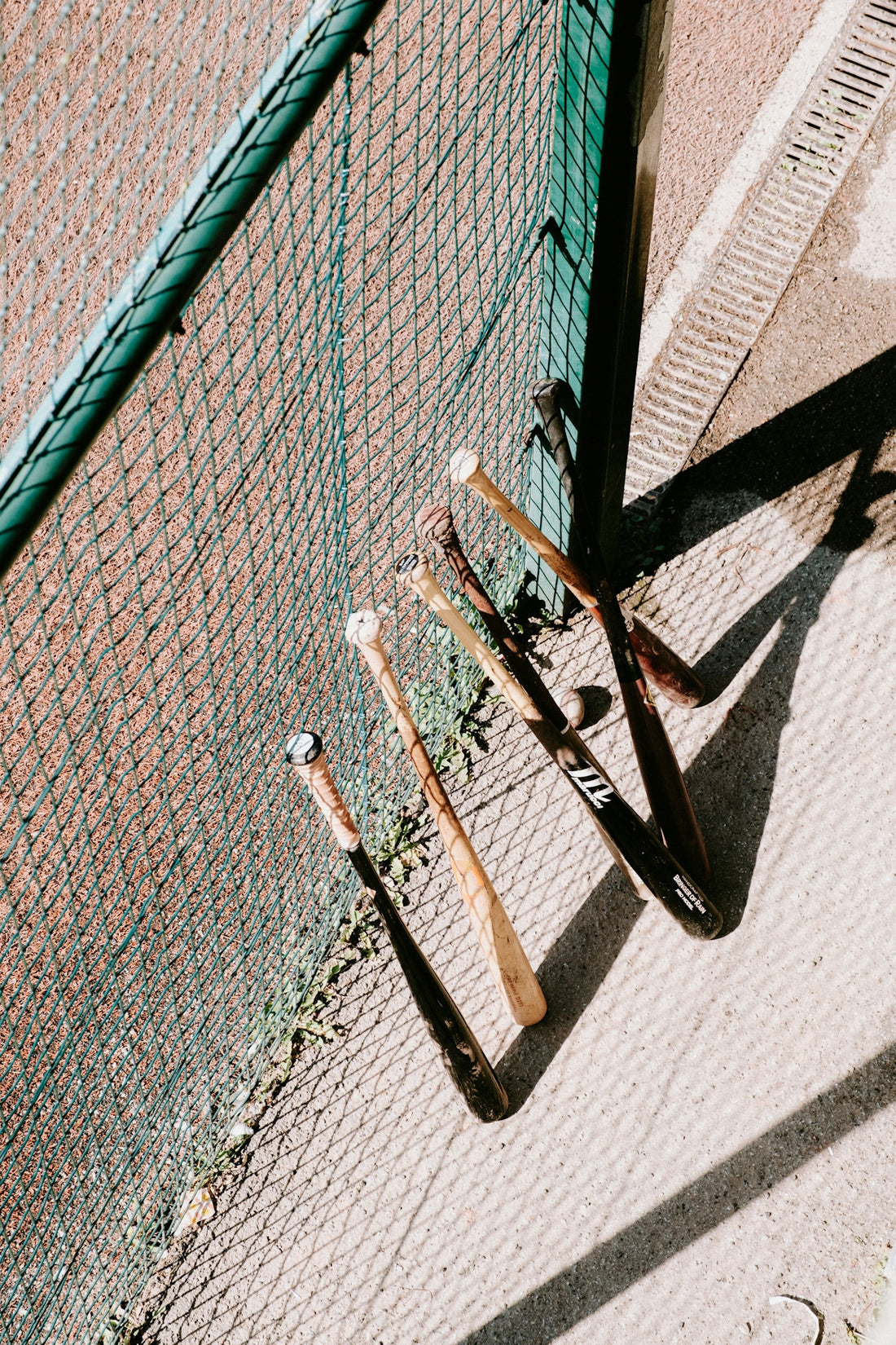 a close up of a tennis racket on the ground