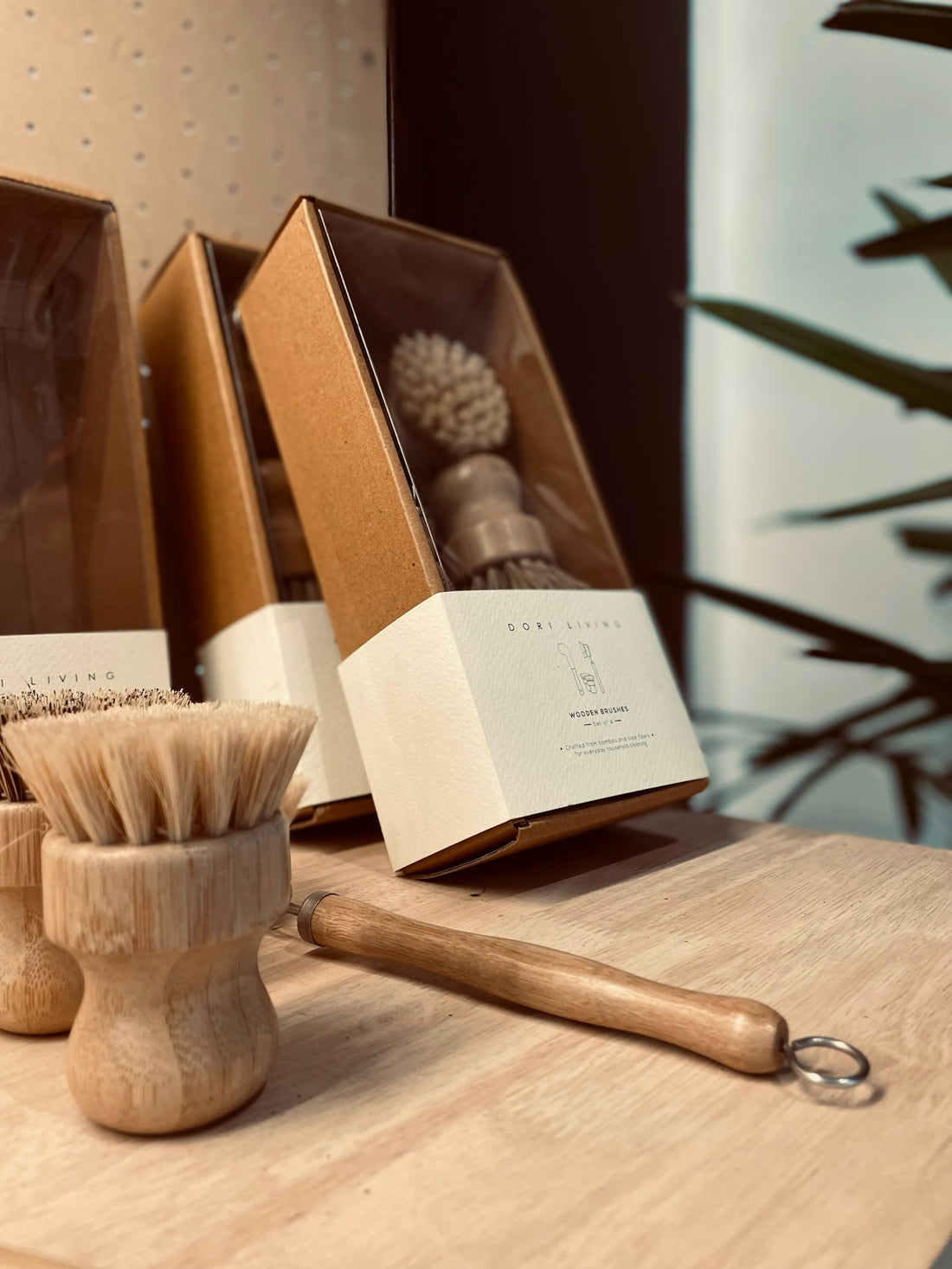 a wooden shaving brush sitting on top of a wooden table